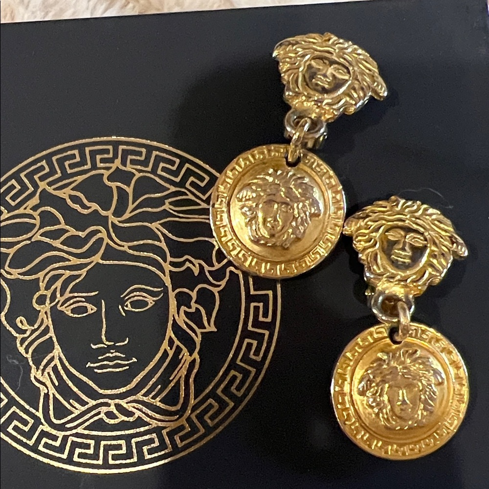 Vintage Versace Gold Medusa Coin Earrings clip on. Drops.